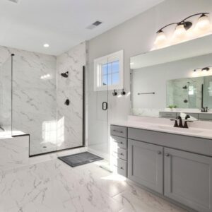 A white bathroom with marble floors and a walk in shower is the epitome of elegance and luxury. Renovating your bathroom not only enhances its aesthetic appeal but also brings along a multitude of benefits.