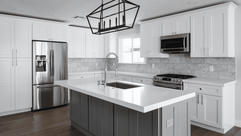 5 Kitchen Upgrades with white cabinets and stainless steel appliances.